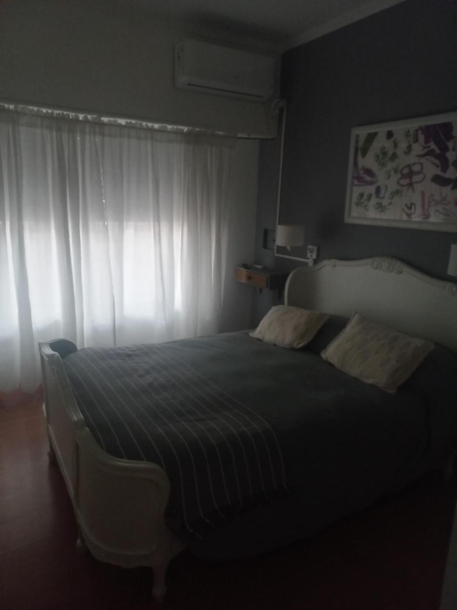 La Biblioteca Apartment Olavarria Bilik gambar